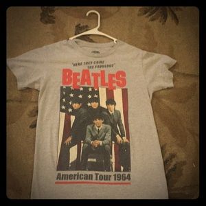 This is a grey Beatles shirt that is used